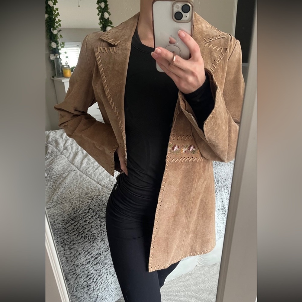 Brandon Thomas leather open front jacket.